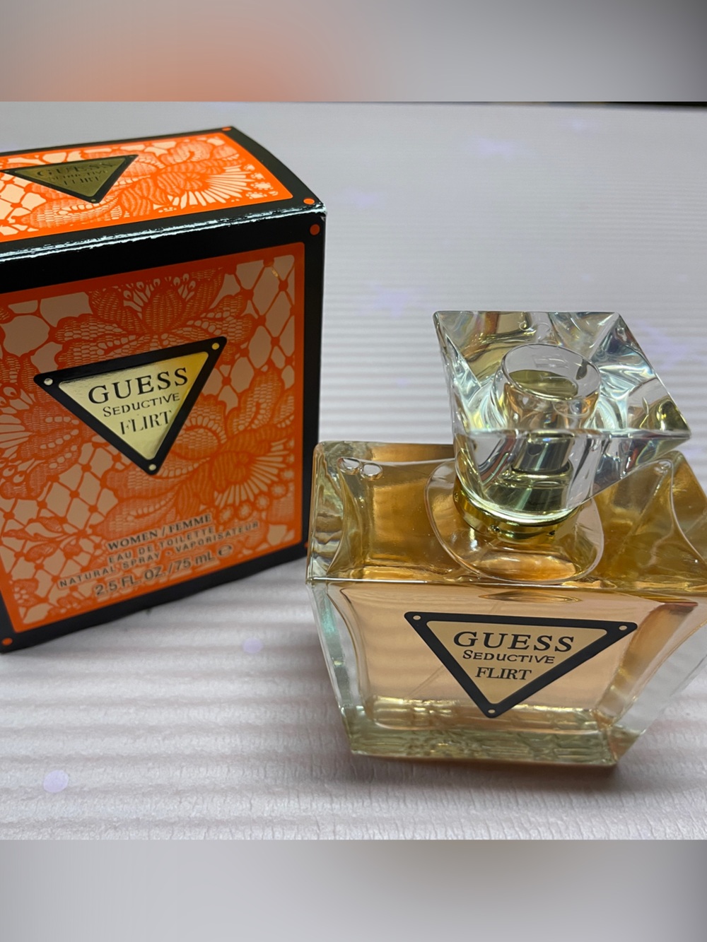 Guess Seductive Flirt Perfume — Orange Box with Clear Glass Bottle